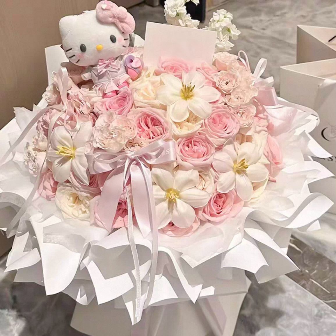 Aurora's Bouquet – 33 Multicolour Roses (includes hello kitty soft toy)