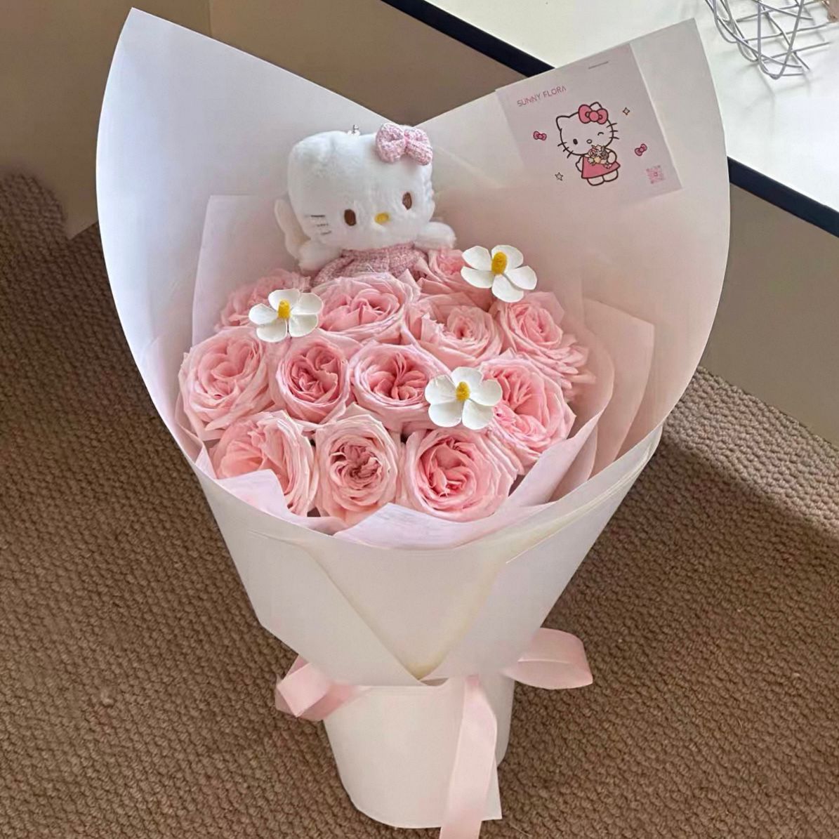 Millie's Bouquet – 12 Pink Roses (includes hello kitty soft toy)